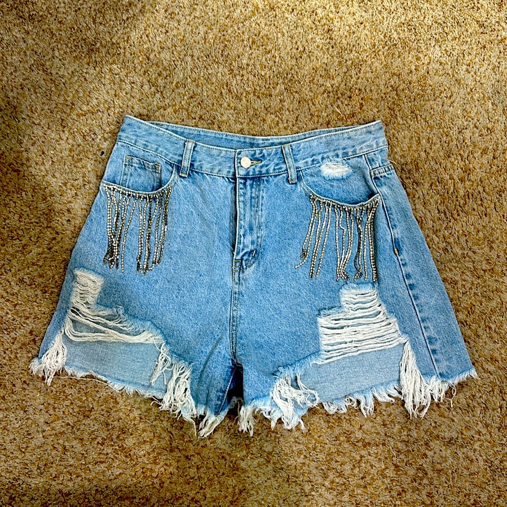 Size extra large cut off Jean shorts. Fits like. 10